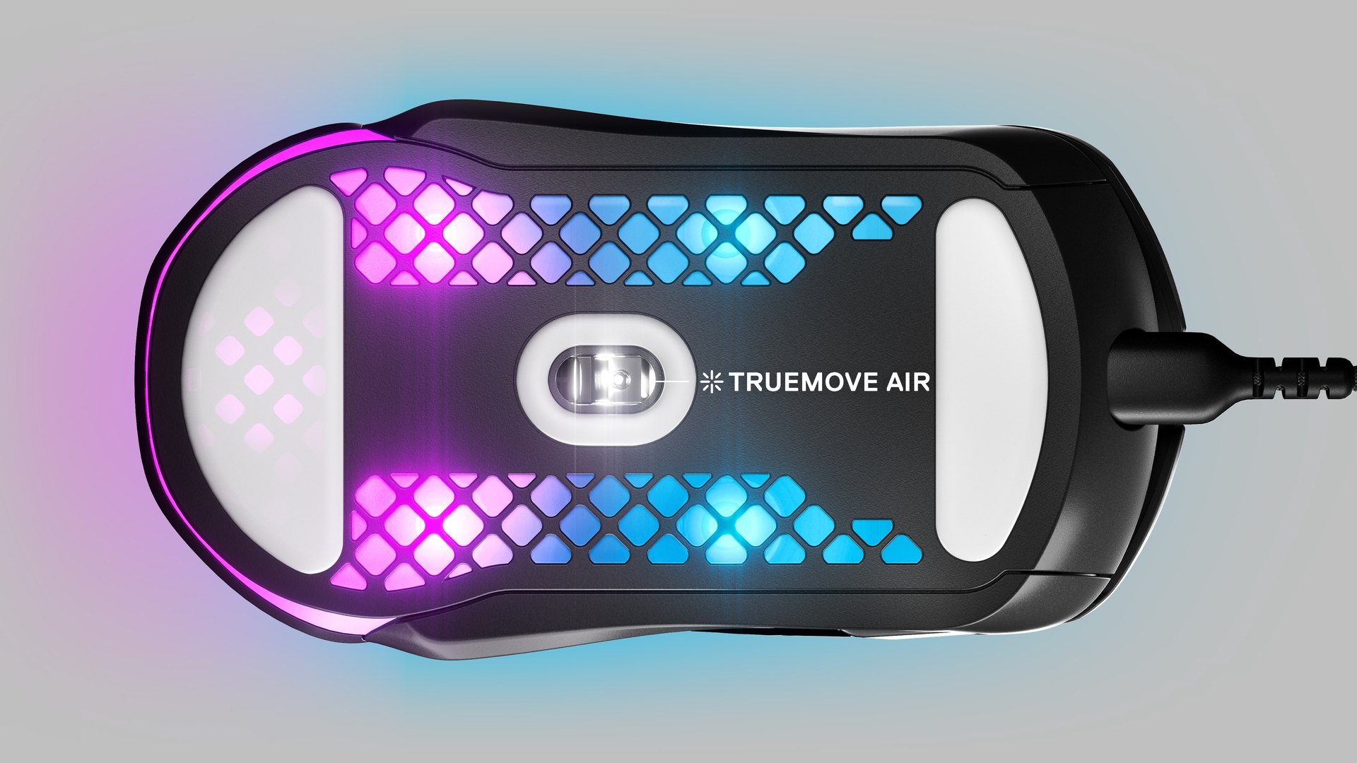 An Aerox 5 mouse shown from beneath with a great view into the sensor and bottom glide skates of the mouse. Text with an arrow pointing to the sensor reads "Truemove Air".