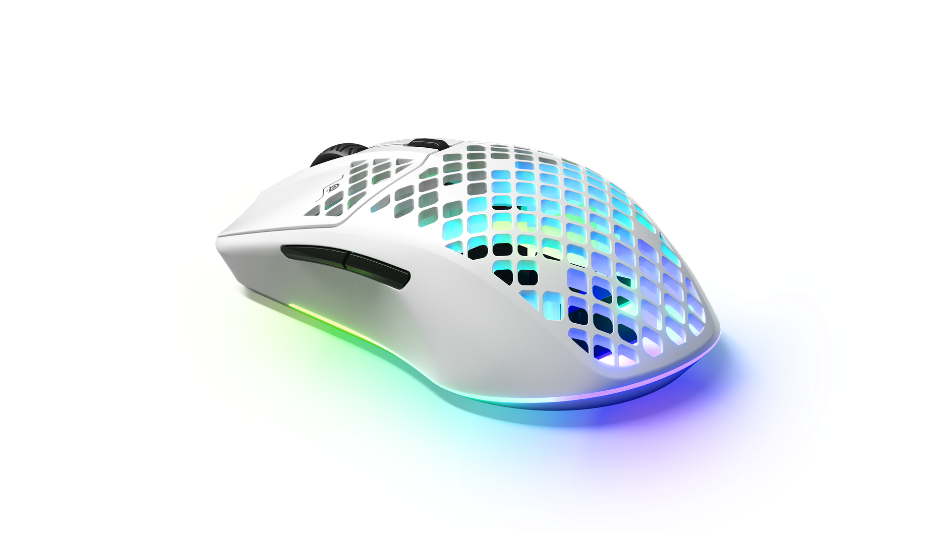 
 Angled view of Aerox 3 Wireless (2022) white gaming mouse. Shows RGB gleaming through holes in mouse.
 